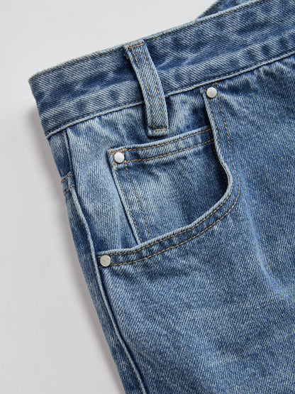 Kira | Jeans Pierna Ancha Asimétricos de Tiro Medio