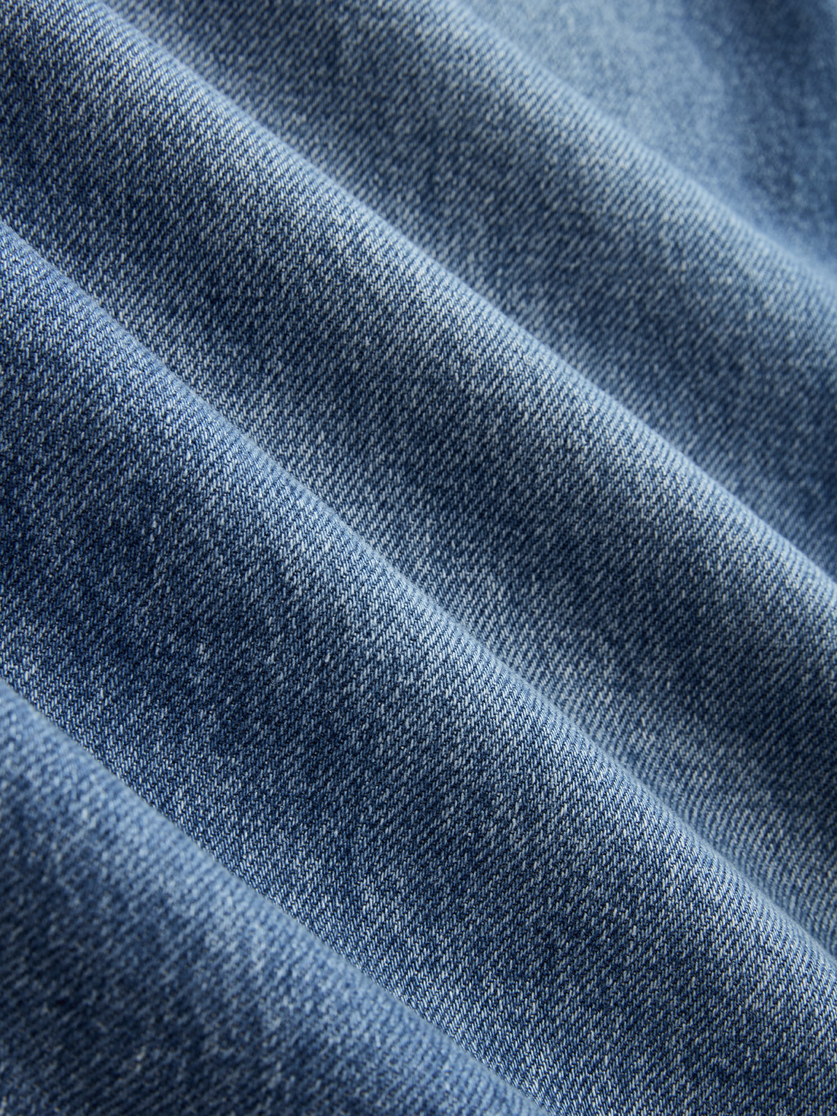 Kira | Jeans Pierna Ancha Asimétricos de Tiro Medio